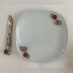 For I heard jeweled plate with silver jeweled knife